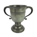 An 18th century pewter loving cup