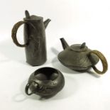 Archibald Knox for Liberty and Co., a Tudric pewter three piece tea set