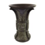 A Chinese bronze Gu vase, Xuande mark