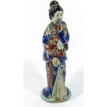 A Japanese Imari figure