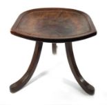 Liberty and Co., an Arts and Crafts mahogany and leather Thebes stool,