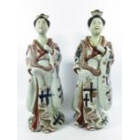 A large pair of Japanese Imari figures