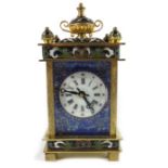 A gilt brass and enamelled mantle timepiece