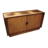 A Dyrlund teak and burr elm sideboard