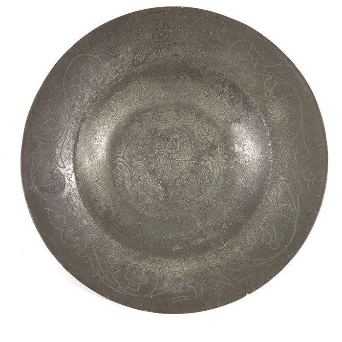 A Charles II pewter broad rimmed dish