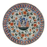 A large Delft faience polychrome plate