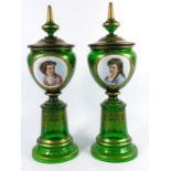 A pair of 19th century Bohemian green cased glass portrait vases