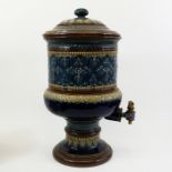 A Royal Doulton art ware blue and brown decorated water filter, 48cm high