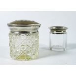 Two George V silver and tortoiseshell cut glass bottles or jars