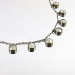 An Arts and Crafts mother of pearl and silver necklace