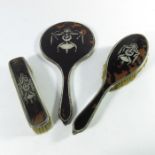 A George V silver and tortoiseshell brush and mirror set