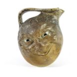 Robert Wallace Martin for Martin Brothers, a stoneware face jug
