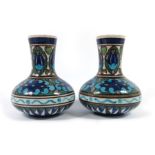 Leonard King for Burmantofts, a pair of Anglo Persian faience vases