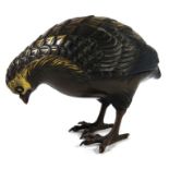 A Japanese bronze figure of a partridge