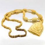 A 19th century carved bone necklace