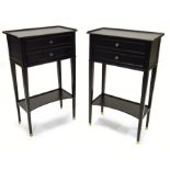 A pair of black lacquered side cabinets