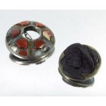 A Scottish hardstone brooch, together with a silver and moulded glass button