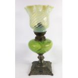 An Arts and Crafts straw opal glass oil lamp