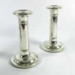 A pair of Edwardian silver Tuscan column candlesticks, Ellis Jacob Greenberg, Birmingham 1908, plain