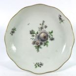 A pair of Meissen dishes, painted with floral bouquets and sprays