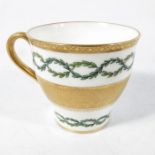 Two Minton coffee cups and saucers