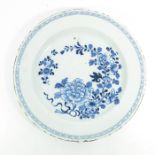 An English Delft blue and white charger