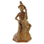 George Tinworth for Doulton Lambeth, a stoneware figure, Merry Musician