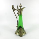 WMF, a Jugendstil silver plated and green glass claret jug