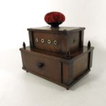 A 19th century American two tier mahogany workbox