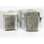 An Edwardian silver stamp envelope vesta case and another
