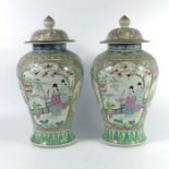 A pair of Japanese famille rose vases, 19th century, in the Chinese Qianlong style