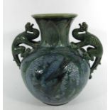 James Dewdney for C H Brannam, an art pottery twin handled dragon vase