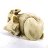 A 19th century Japanese carved ivory netsuke