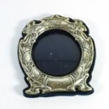 An Arts and Crafts silver photo frame, Sydney & Co