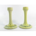 A pair of Ruskin lustre candlesticks