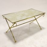 A rectangular mirrored glass and brass coffee/cocktail table