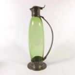 Archibald Knox for Liberty and Co., a Tudric pewter and glass claret jug