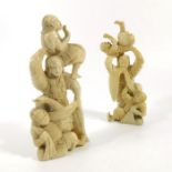 λ A pair of 19th century Japanese ivory figures