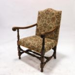 A 17th century style open armchair
