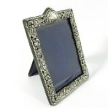 A Victorian silver embossed and reticulated photo frame, James Deakin and Sons
