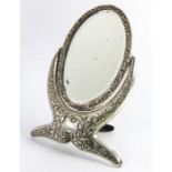 An Edwardian silver dressing mirror
