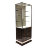 An Art Deco style display cabinet in macassar