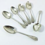 A matched set of George III and later Irish silver dessert spoons, various makers