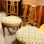 A pair of lyre back chairs with stuff-over seats