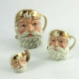 A group of three Royal Doulton character jugs, small, miniature and tiny Santa Claus, each with gold