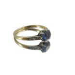 A sapphire and diamond ring