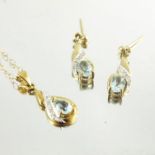 9 carat gold aquamarine and diamond earrings and pendant