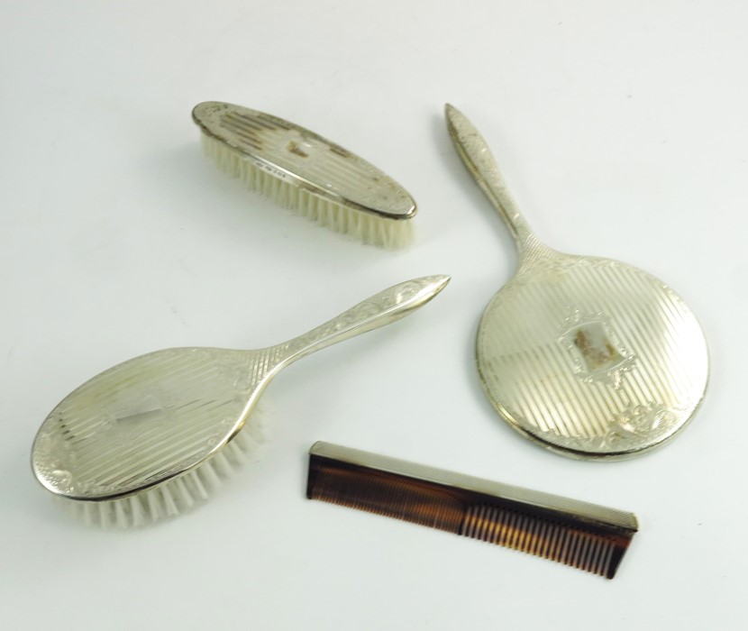 An Elizabeth II silver backed dressing set, W I Broadway and Co. - Image 2 of 3