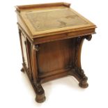 A Davenport walnut desk, 19th century, 74cm high