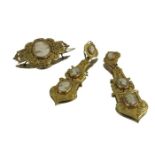 A 19th century cameo and gilt metal earring and brooch set, circa 1850